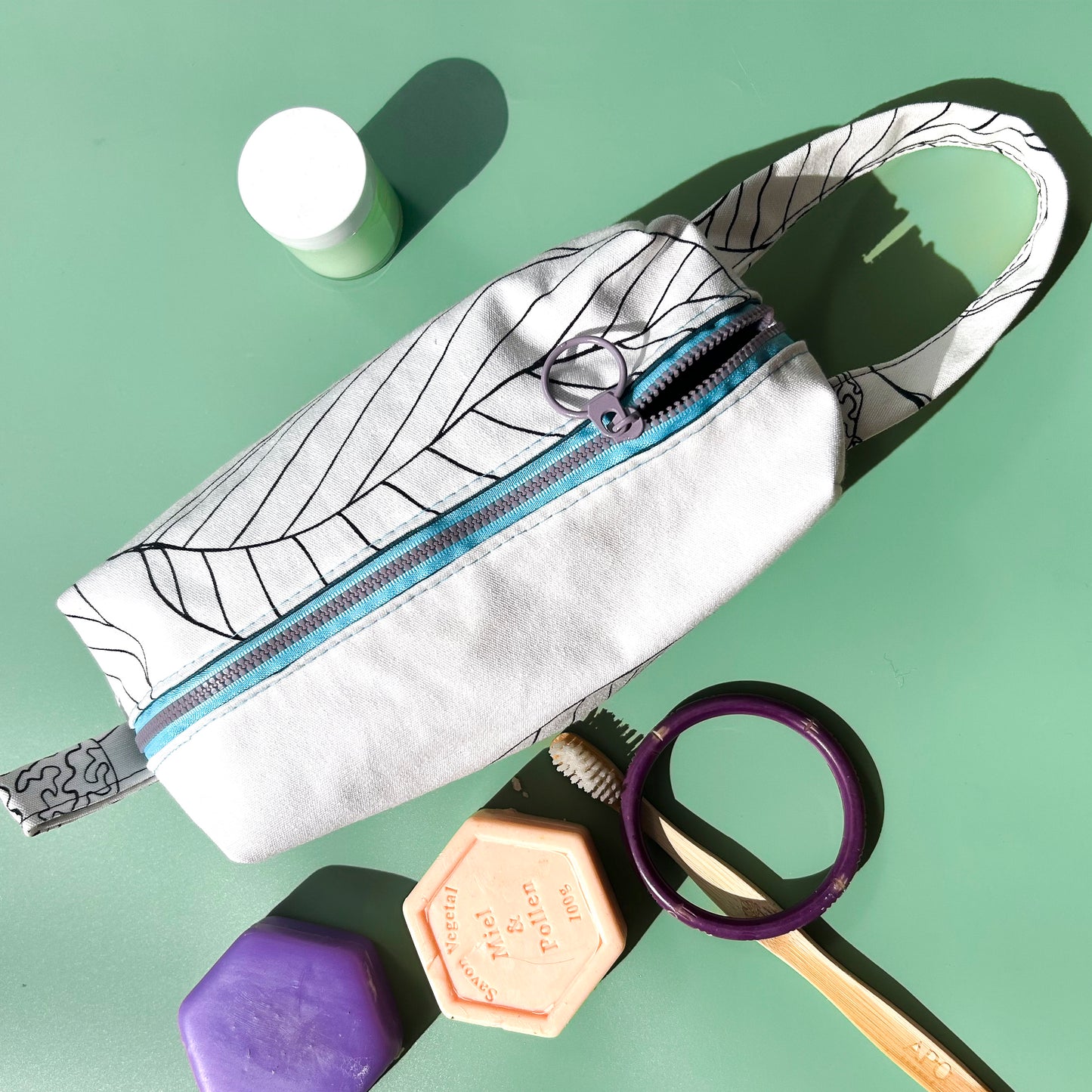 Trousse upcyclée feuille et encre - intérieur tissu enduit