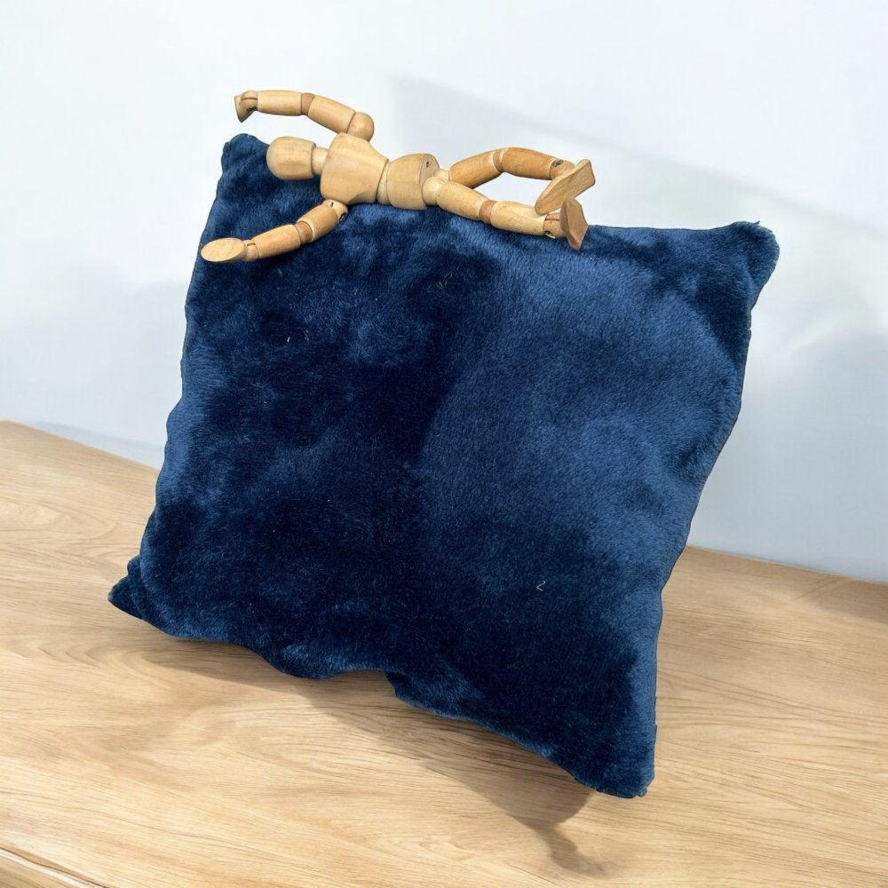 Petit coussin de voyage hypnotique