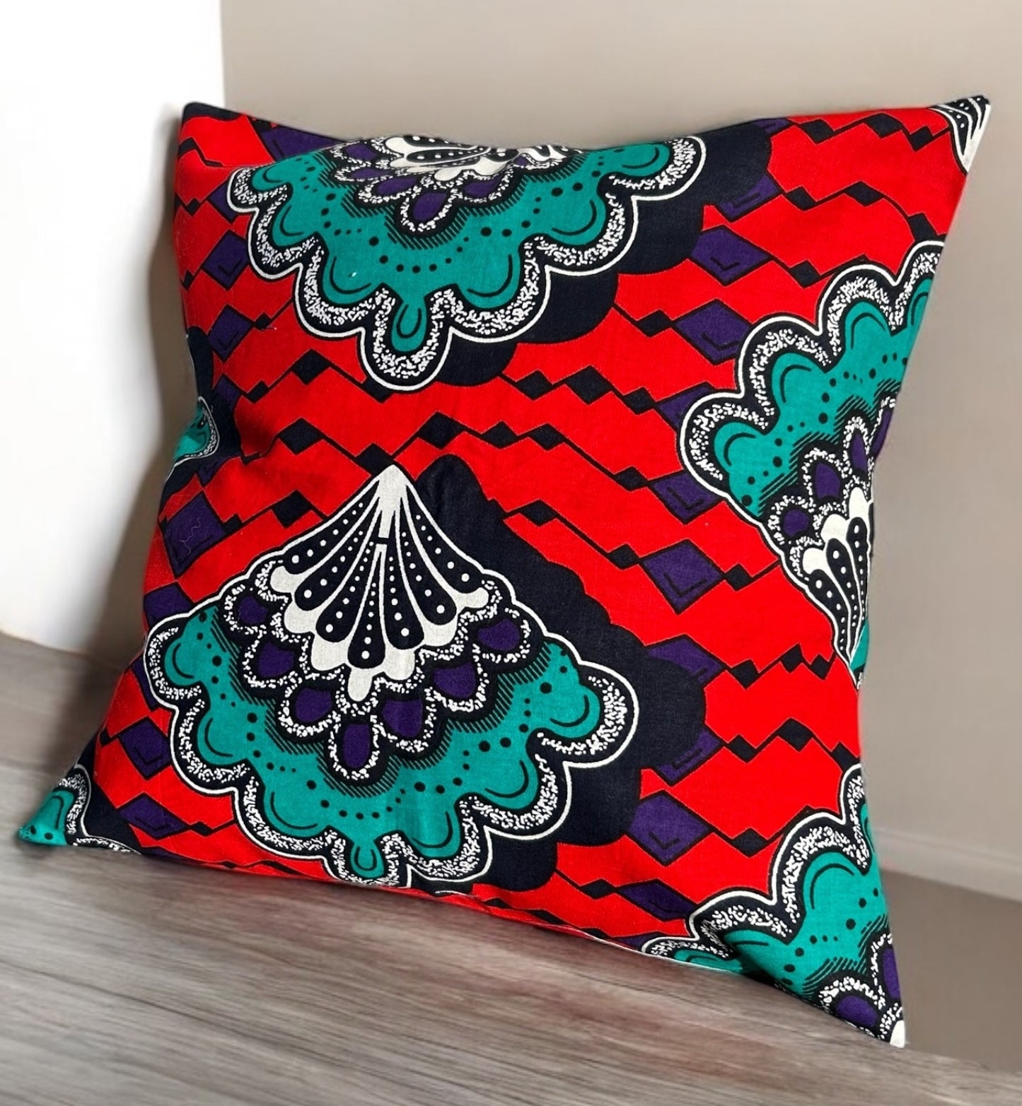 Housse de coussin portefeuille - wax - rouge et motifs turquoises