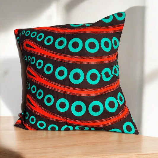Housse de coussin portefeuille - wax "anneaux turquoises"